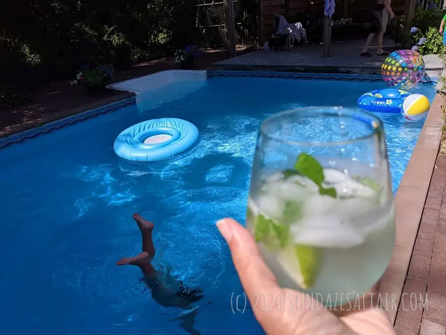 Mint Lime Mojito By The Crystal Clear Blue Pool At Pool Party