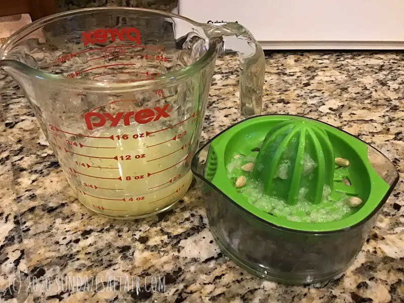 Squeezing Lemon Juice For Lemon Pudding Cake Custard Batter