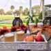 Homemade Warm Caramel Apple Cider Like Starbucks On Wooden Tray Surrounded By Fall Garland Overlooking Beautiful Lake And Scenery