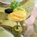Lemon Custard Pudding Cake In Martini Glass With Berries And Mint