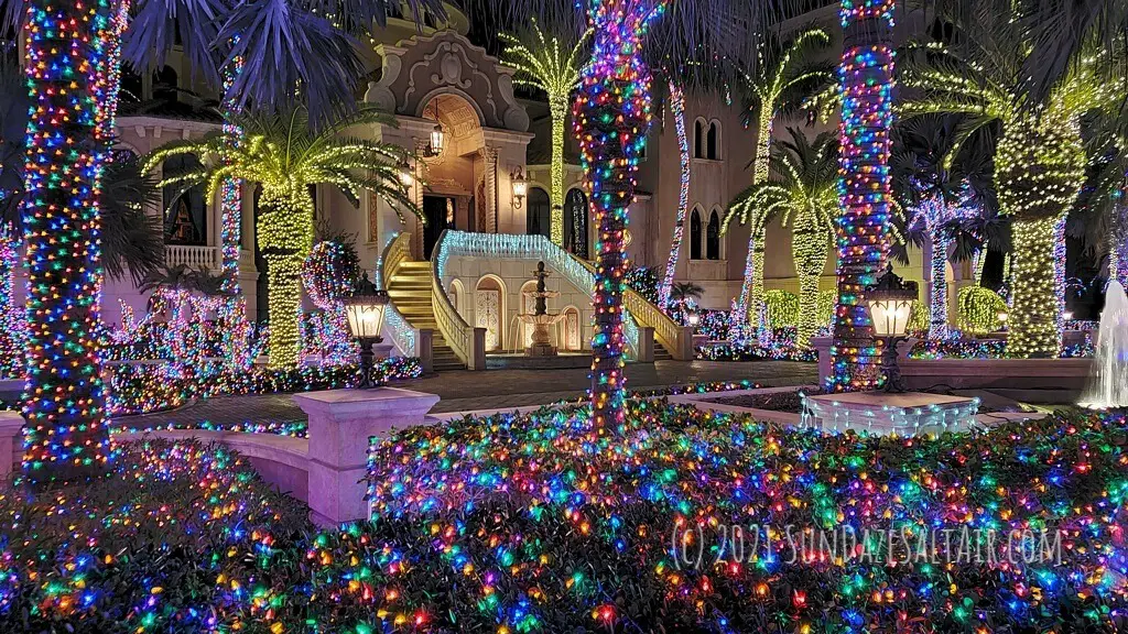 Best Colorful Landscape Lighting Ideas Plus Advantages Of Outdoor LED & Solar Color Changing Lights To Illuminate Your Landscape In Color - Gorgeous house & palm trees decorated in thousands of commercial LED lights