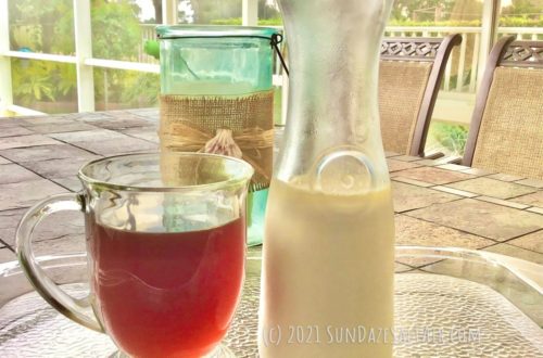 Best Healthy Homemade Coffee Creamer Made Naturally_Easy, Delicious, No Trans Fats_On Tray To Be Served Outside Looking At View