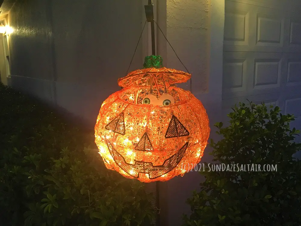 October Garden Chores should include adding a few jack o' lanterns to the landscape like this one with a spooky surprise inside