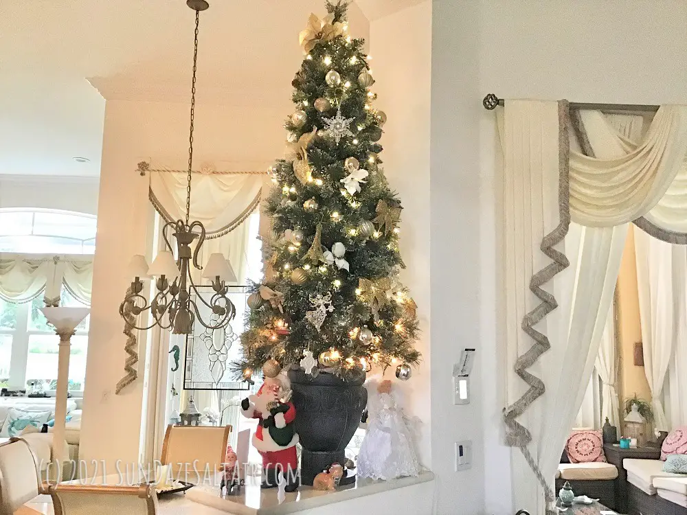 How To Decorate A Room With High Ceilings For Christmas-Place smaller size Christmas trees with classical decorations on ledges or table-tops