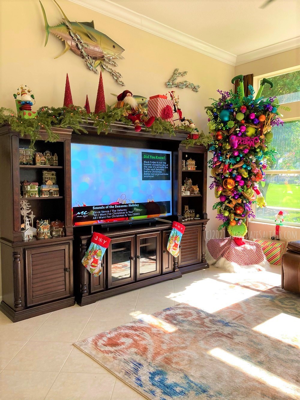 How To Decorate A Room With High Ceilings? Consider the Grinch tree... the Grinch upside down Christmas tree makes a beautiful living room look like it belongs in Whoville